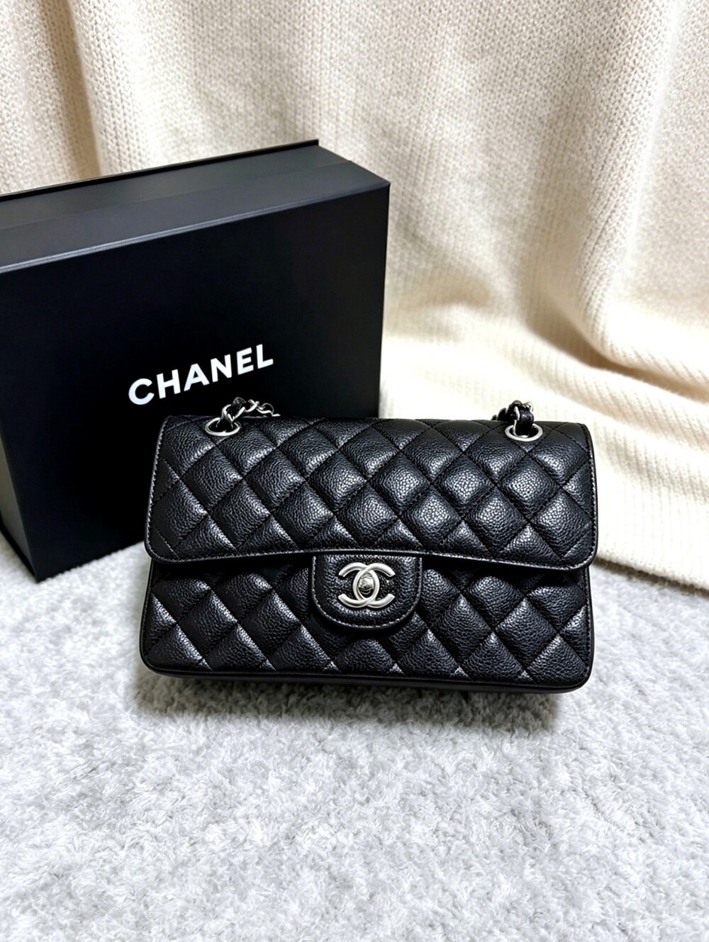 CHANEL Classic Flap Bag in Black Caviar Leather